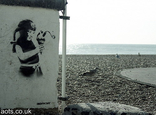 Banksy Seaside girl photo